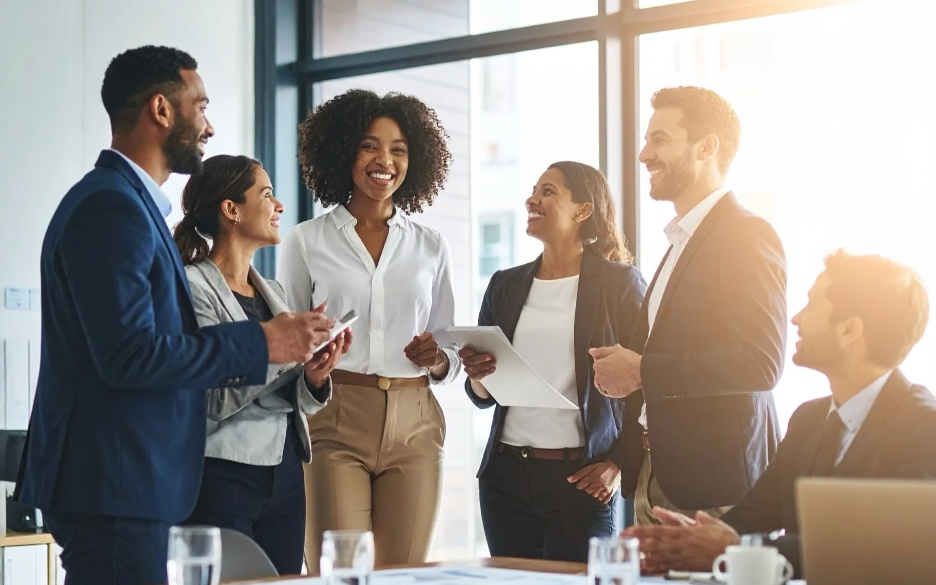 Diverse team collaborating on planning for a development program